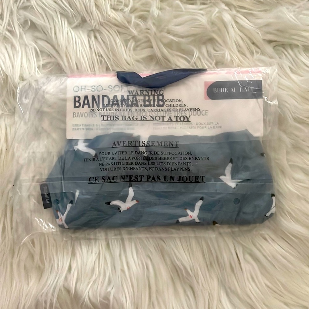 Bebe au lait bandana bib in blue muslin material with white birds